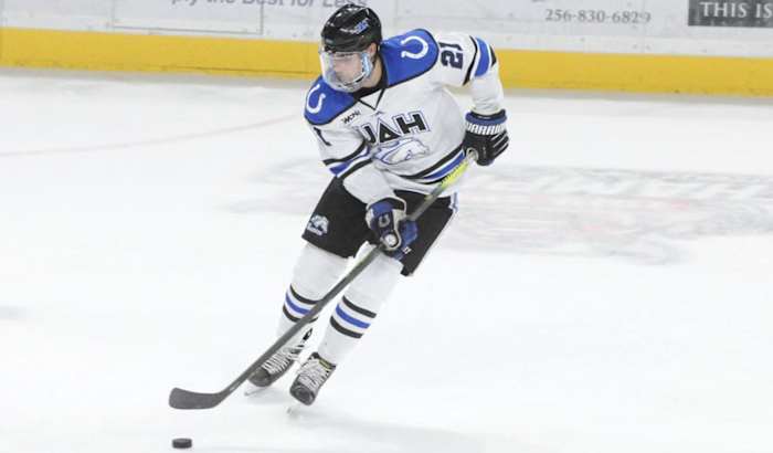 Izyk skating with the Chargers last season.